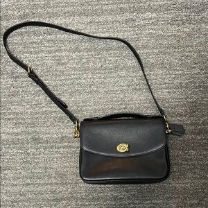 Coach Black Crossbody Bag with adjustable and removable strap.
